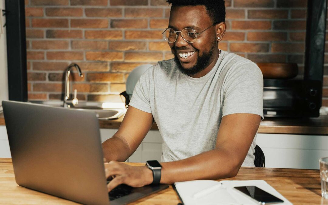 African-American young man applying to grant online