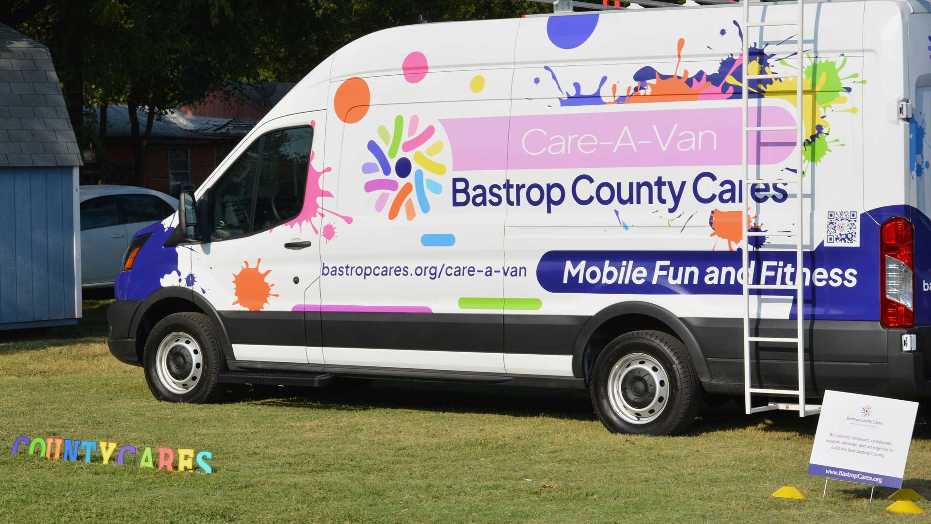 Bastrop County Cares white resource Care-A-Van