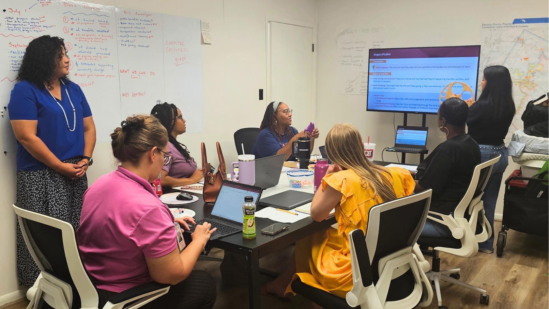 Bastrop County Cares Team in meeting - women team